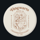 HOGWARTS™ School of Witchcraft and Wizardry Crest Magnet<br><div class="desc">Honor the legacy of the wizarding world with this timeless Hogwarts™ School of Witchcraft & Wizardry crest design. Featuring the iconic four-house shield — lion, serpent, badger, and eagle — this elegant artwork represents the unity and tradition of Gryffindor™, Slytherin™, Hufflepuff™, and Ravenclaw™. Rendered in a refined, vintage-inspired line style,...</div>