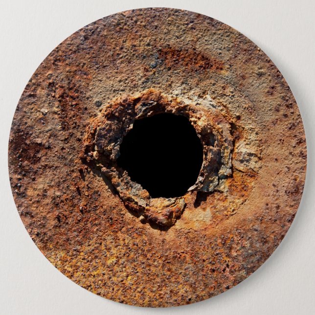 Hole in rust 6 cm round badge (Front)