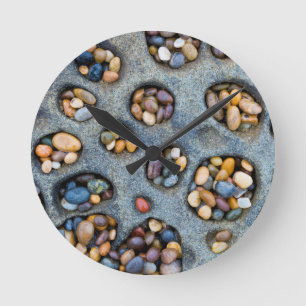 Holes filled with pebbles, CA Round Clock
