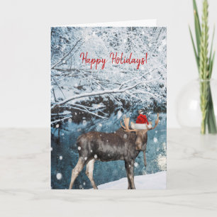Holiday card with a moose in the snow