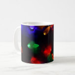 Holiday Photo Christmas fairy lights on real snow Coffee Mug<br><div class="desc">Beautiful colour/colour photograph of Christmas fairy lights on real snow. The string of lights is blue, red, orange, green and yellow reflecting on a dark black background. I took this photo in winter outdoors and with only natural lighting. Would make a great holiday xmas gift or Hanukah present . Fun...</div>