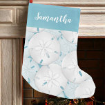 Holiday Simple Beach Tropical Sand Dollar  Small Christmas Stocking<br><div class="desc">This design features a Christmas holiday turquoise blue cute stocking with a stylish trendy calligraphy script, a festive cute simple minimalist style, a creative unique cool coastal nautical, a beach tropical ocean sea seashells, a white sand dollar crustacean aquatic, a family vacation trip keepsake, a beach house cottage home décor,...</div>