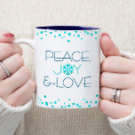 Holiday Simple Modern Snowflake Peace Joy Love Two-Tone Coffee Mug<br><div class="desc">“Peace, joy & love.” A fun, playful, snowflake illustration and modern turquoise and dark blue typography on a white background help you usher in the holiday season. Turquoise confetti dots frame complete the look. Feel the warmth and joy of the holidays whenever you drink out of this stunning, colourful holiday...</div>