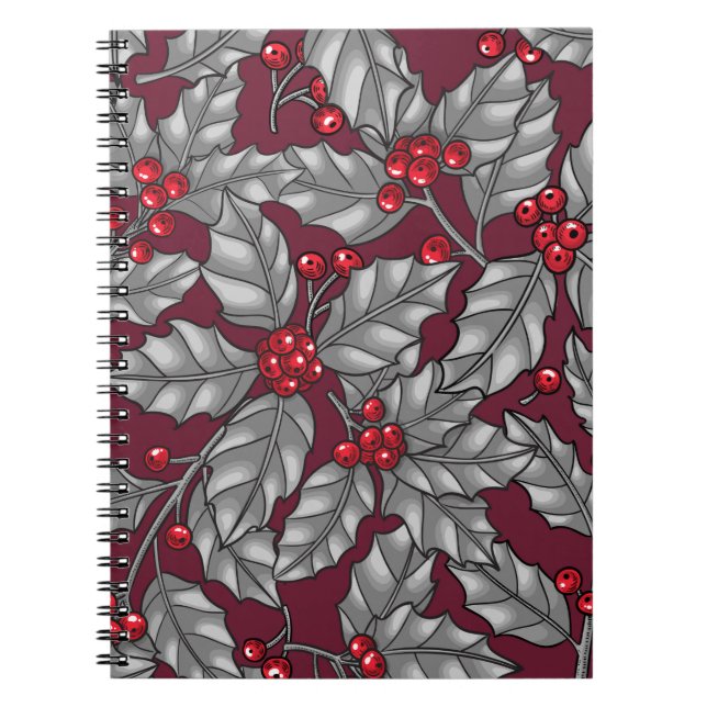 Holly berry, grey leaves on dark red notebook (Front)