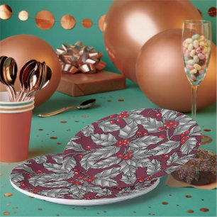 Holly berry, grey leaves on dark red paper plate