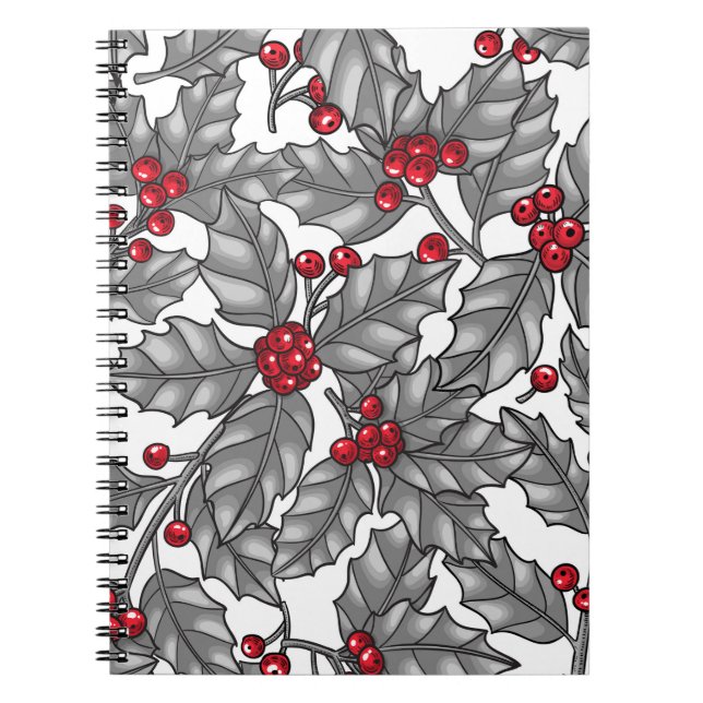 Holly berry, grey leaves on white notebook (Front)