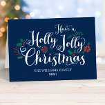 Holly Jolly Christmas Navy Blue Photo Holiday Card<br><div class="desc">"Have a Holly Jolly Christmas" holiday greeting cards feature a dark navy blue background,  white handwritten style script,  and festive berries,  holly leaves,  poinsettia,  and winter evergreen design accents. Personalise with a photo and custom message on the inside.</div>