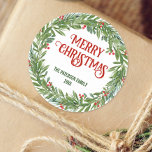 Holly Wreath Family Name Christmas White Classic Round Sticker<br><div class="desc">Add a touch of festive charm to your presents with this white round sticker featuring a classic Christmas wreath. Customise it with your family's name and "Merry Christmas" message for a warm and welcoming holiday vibe.</div>