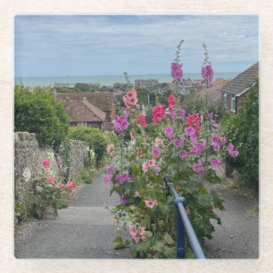 Hollyhocks alongside St Leonards Church wall Hythe Glass Coaster