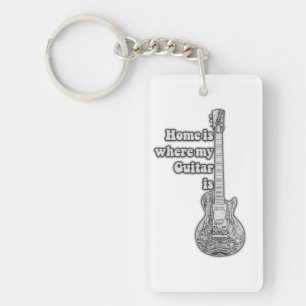 Home is where my guitar is. vintage black & white key ring