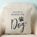 Home Is Where The Dog Is Cushion<br><div class="desc">This dog lover's throw pillow features a dog's paw print and reads,  "Home is where the dog is."</div>