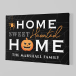 Home Sweet Haunted Home Personalised Halloween Canvas Print<br><div class="desc">Welcome your guests with this spooky fun personalised Halloween canvas wall art. The stylish typography design features "Home Sweet Haunted Home" wording with custom text for your family name and accents of a scary jack-o-lantern pumpkin, creepy dangling spider, and spider web background. Includes a black, grey, white, and orange colour...</div>
