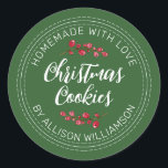 Homemade Christmas Cranberry Cookies Green Classic Round Sticker<br><div class="desc">Rustic and modern homemade baked goods sticker with the text homemade with love, christmas cookies and your name in off-black handwritten script calligraphy and modern typography on a green background with a stylish touch of cranberries sprigs. Simply add your name and the product name to the label. Exclusively designed for...</div>