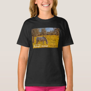 Horse grazing in a yellow flowers meadow T-Shirt