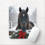 Horse With a Christmas Wreath Mouse Pad<br><div class="desc">A horse stands behind a wooden fence adorned with a festive wreath and red bow,  surrounded by a snowy winter landscape</div>