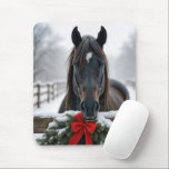 Horse With a Christmas Wreath Mouse Pad<br><div class="desc">A horse stands behind a wooden fence adorned with a festive wreath and red bow,  surrounded by a snowy winter landscape</div>