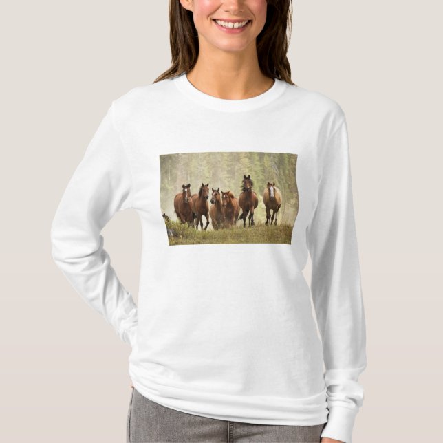 Horses cresting small hill during roundup T-Shirt (Front)