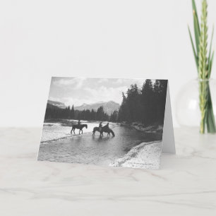 Horses drinking from and crossing a river card