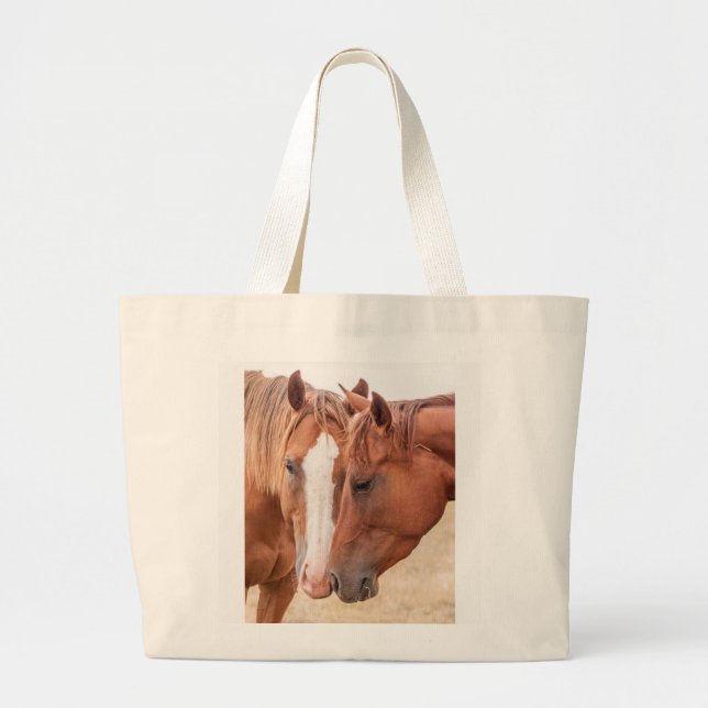 Horses nuzzling in a pasture large tote bag (Front)
