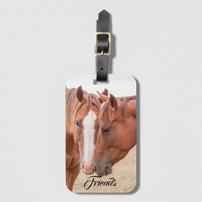 Horses nuzzling in a pasture luggage tag (Front Vertical)