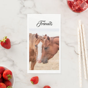 Horses nuzzling in a pasture napkin