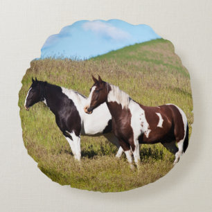 Horses on the hillside round cushion