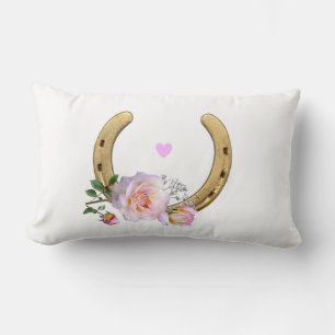 Horseshoe and flowers on white lumbar cushion