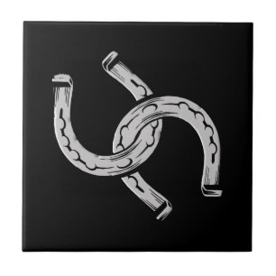 Horseshoes on Black Tile