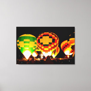 Hot Air Balloons Glowing at Night Canvas Print