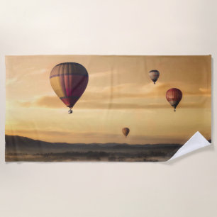 Hot Air Balloons in Golden Skies Beach Towel