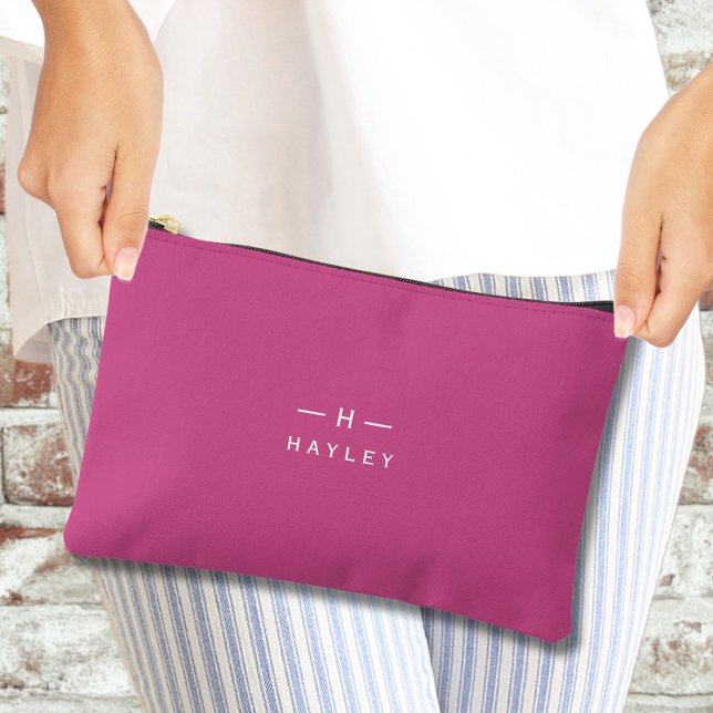 Hot pink chic monogram  accessory pouch (Hot pink monogram accessory pouch being held by a woman's hands)
