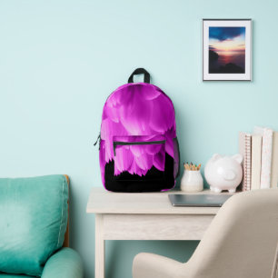 Hot pink flower petals on black printed backpack