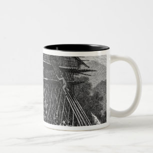 House in the Arfak village of Memiwa, New Guinea Two-Tone Coffee Mug