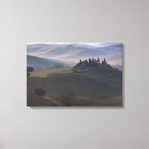 House in Tuscany in the morning fog canvas print