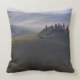 House in Tuscany in the morning fog throw pillow