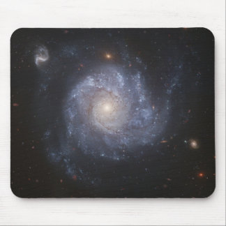 Hubble Snaps Images of a Pinwheel-Shaped Galaxy Mouse Pad
