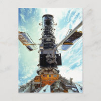 Hubble Space Telescope and astronauts