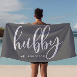 Hubby Grey And White Newlywed Groom Beach Towel<br><div class="desc">Embrace your newlywed status with this stylish "Hubby" beach towel in grey and white, perfect for honeymoons, beach outings, or relaxing by the pool. Created with grooms and husbands in mind, this towel can be personalised with a last name, making it a thoughtful and unique gift. Whether by the beach...</div>