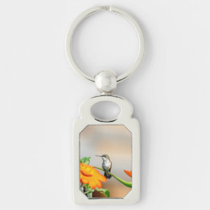 Hummingbird on a flowering plant key ring