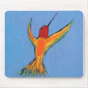 Hummingbird on blue mouse pad