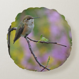 Hummingbird purple pink floral background round cushion