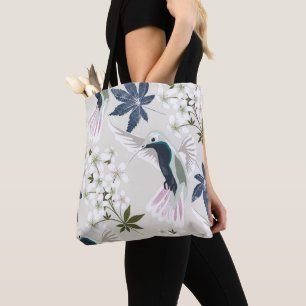 Hummingbirds and white flowers. tote bag