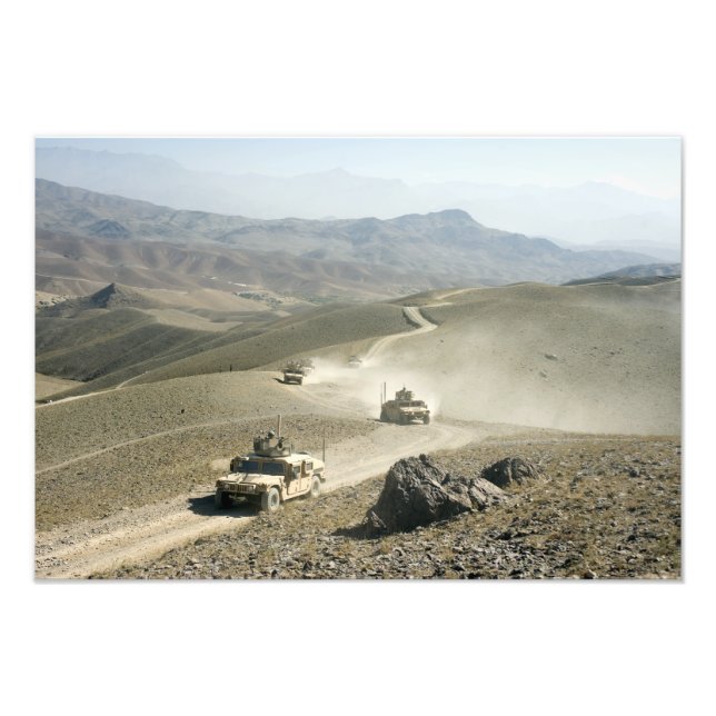 Humvees traverse rugged mountain roads photo print (Front)
