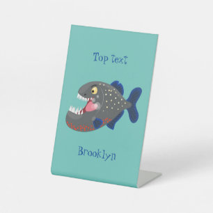 Hungry funny piranha cartoon illustration pedestal sign