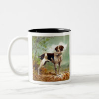 Hunter dog with bird in mouth