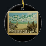 Huntington Beach Vintage Travel Ceramic Tree Decoration<br><div class="desc">This Greetings From Huntington Beach vintage postcard design features a sandy beach with a beautiful turquoise ocean water and above the sea,  a blue sky with billowy white clouds. In vintage travels style.</div>