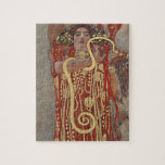 Hygieia by Gustav Klimt, Vintage Art Nouveau Jigsaw Puzzle<br><div class="desc">Hygieia (c. 1901) by Gustav Klimt is a vintage Victorian Era Symbolism painting featuring the Greek goddess of hygiene, health, cleanliness, and sanitation along with the Aesculapian snake around her arm and the cup of Lethe in her hand. Hygieia is part of one of three paintings known as “The Faculty...</div>