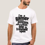I Am A Gamer Humour and Funny Video Games T shirt<br><div class="desc">Cool and funny t shirt for video games lovers. I'm a gamer because punching people in real life is frowned upon. Are you one of those who stay up all night playing video game on your xbox, wii or playstation console? Then this tee is for you. Or if you know...</div>