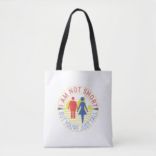 I am not short but you're just tall tote bag