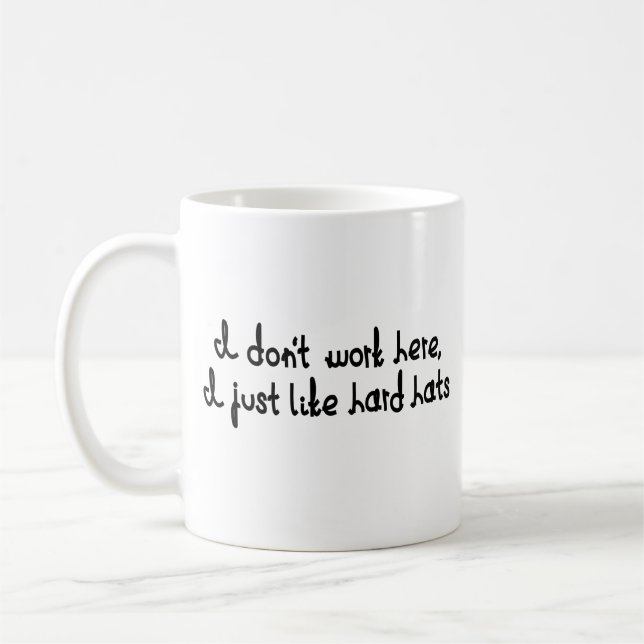 I don't work here, I just like hard hats.  Coffee Mug (Left)